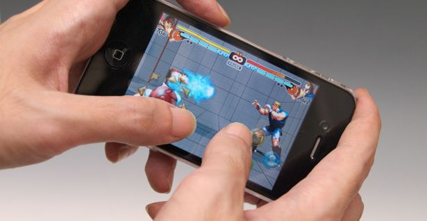 japanese overlay adds tactile d pad and buttons to iphone image 1