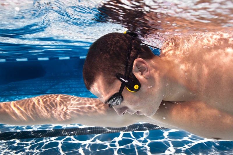 finis neptune lets you listen to music while swimming using your cheekbones image 1