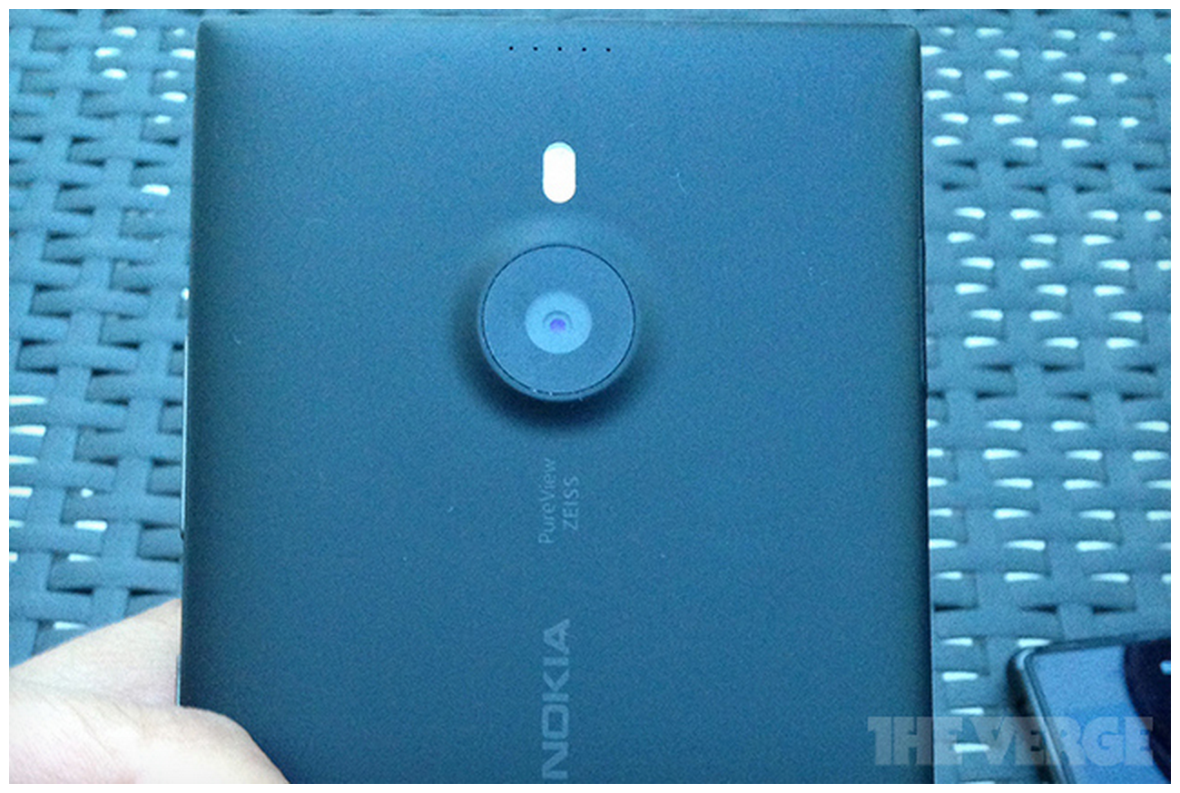 nokia s 6 inch lumia 1520 shown towering over a sony xperia image 1
