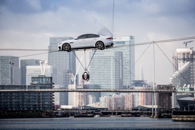 bond stuntman reveals jaguar xf 2015 during high wire stunt see it all here in pictures image 1