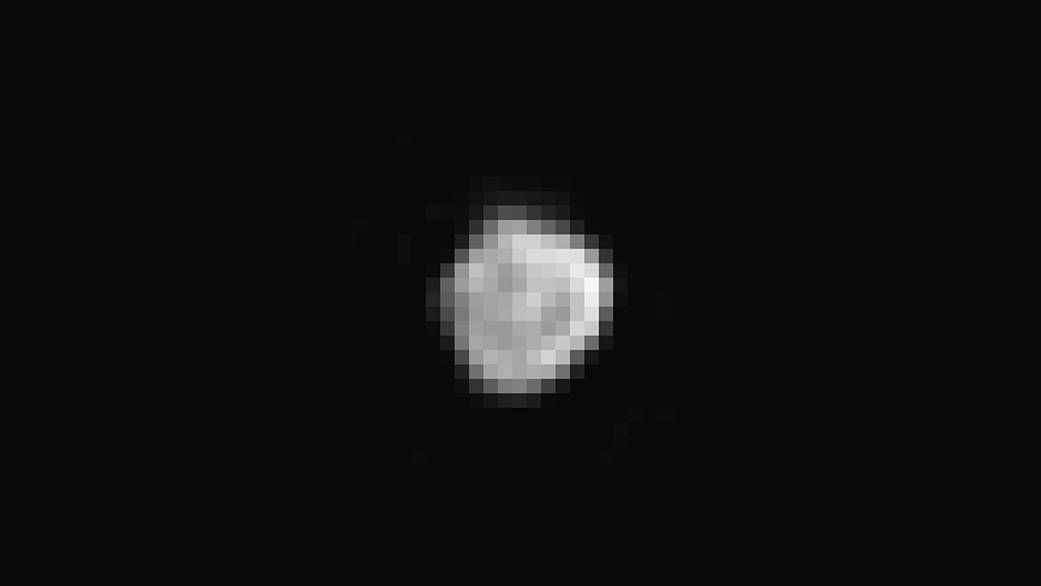 here are the first really up close nasa pics of pluto and its moons image 15