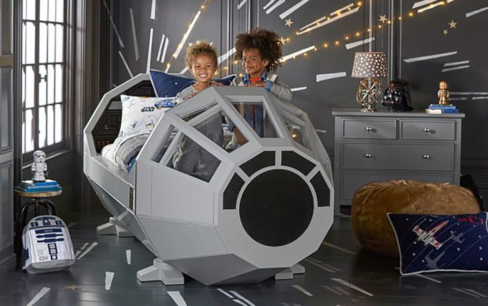 this millennium falcon bed is for kids but we want one too image 1