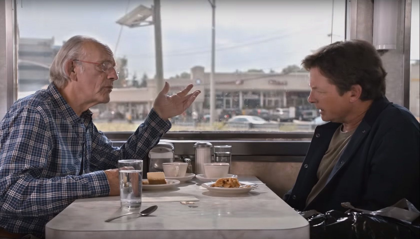 watch michael j fox and christopher lloyd joke about the tech of back to the future ii image 1