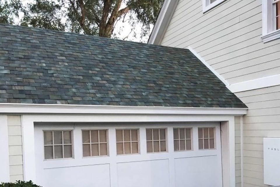 tesla solar roof will power your home and look good in the process image 1