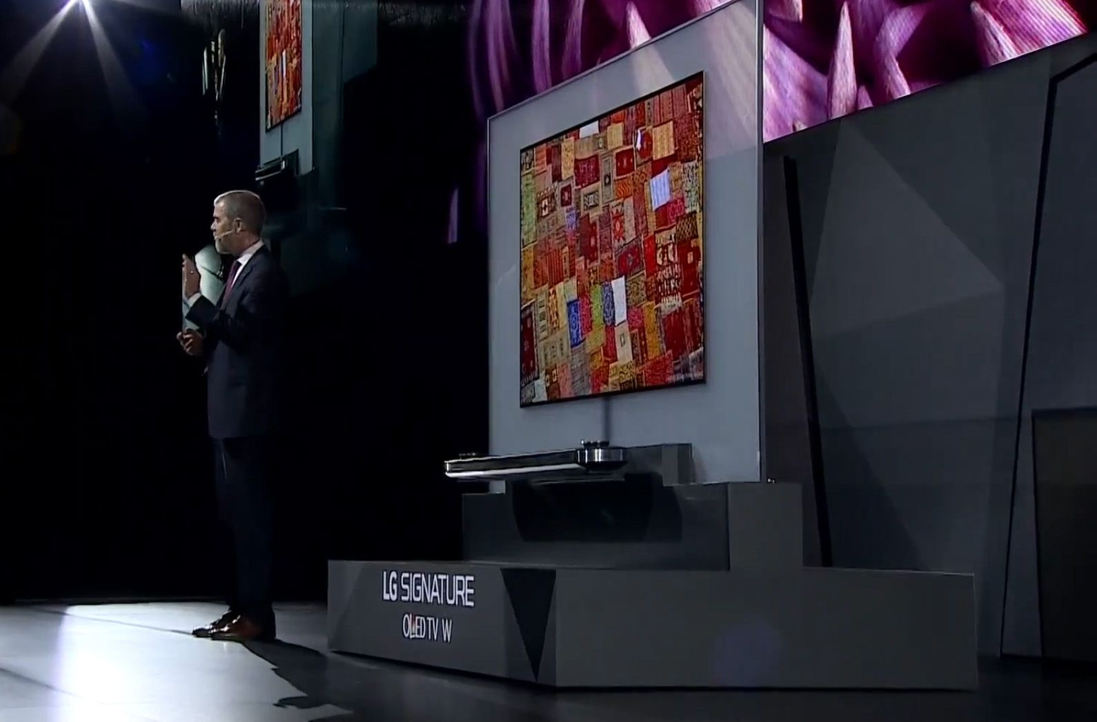 lg signature oled w tv attaches to your wall using magnets and is just 2 5mm thick image 1