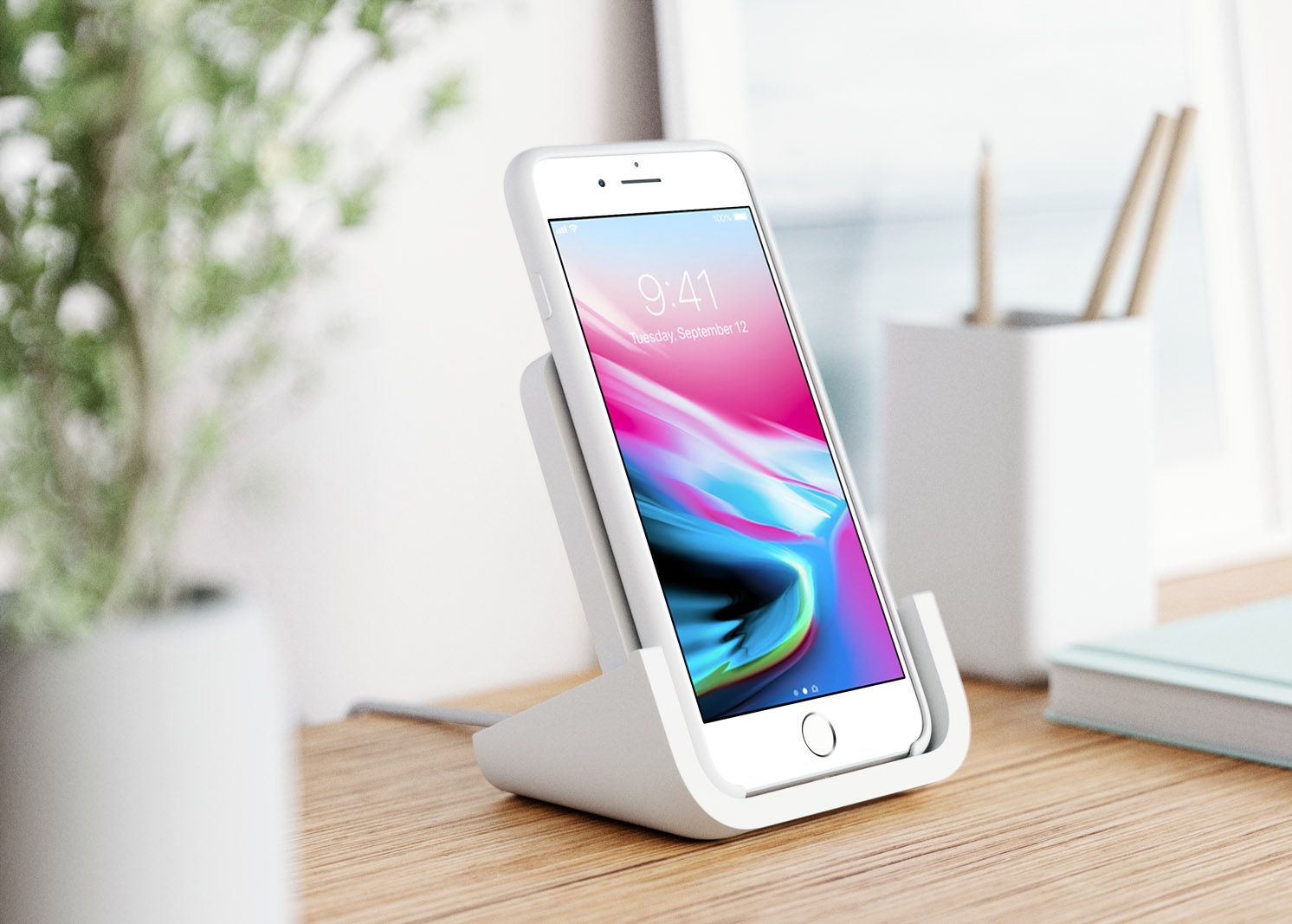 Logitechs Powered wireless iPhone stand charges while you still use your phone image 1