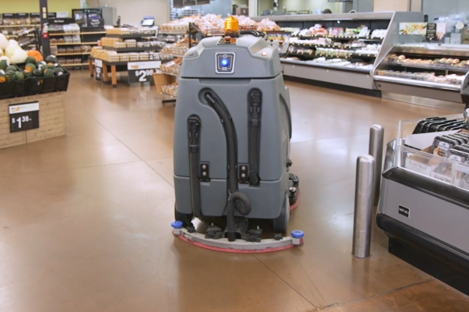 Walmart doubles down on robots in a move to free up its staff image 1