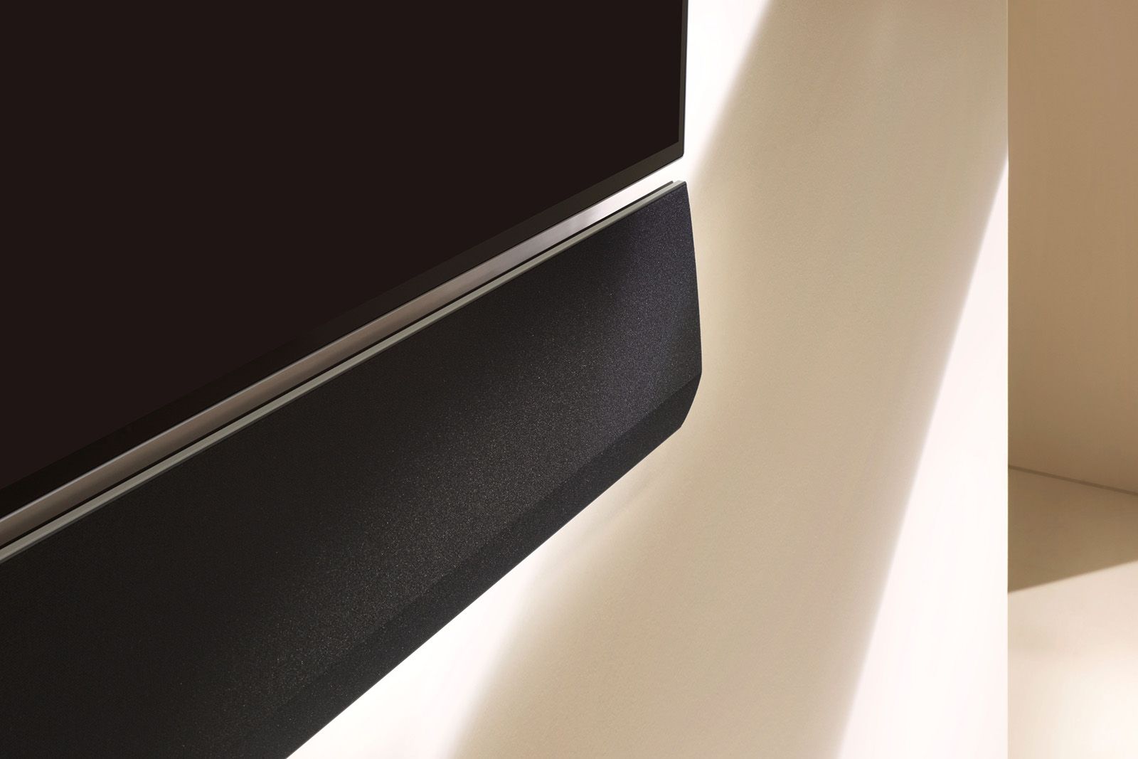 LG GX soundbar sits flush to wall to match Gallery OLED TVs photo 1