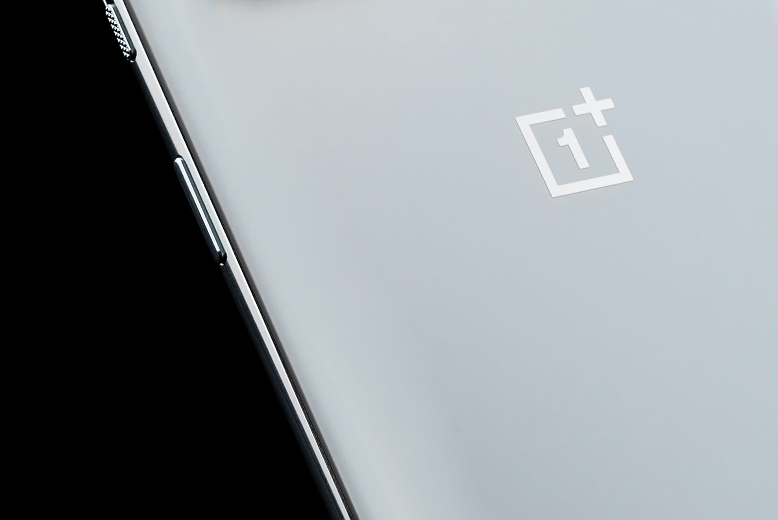 OnePlus logo on silver phone