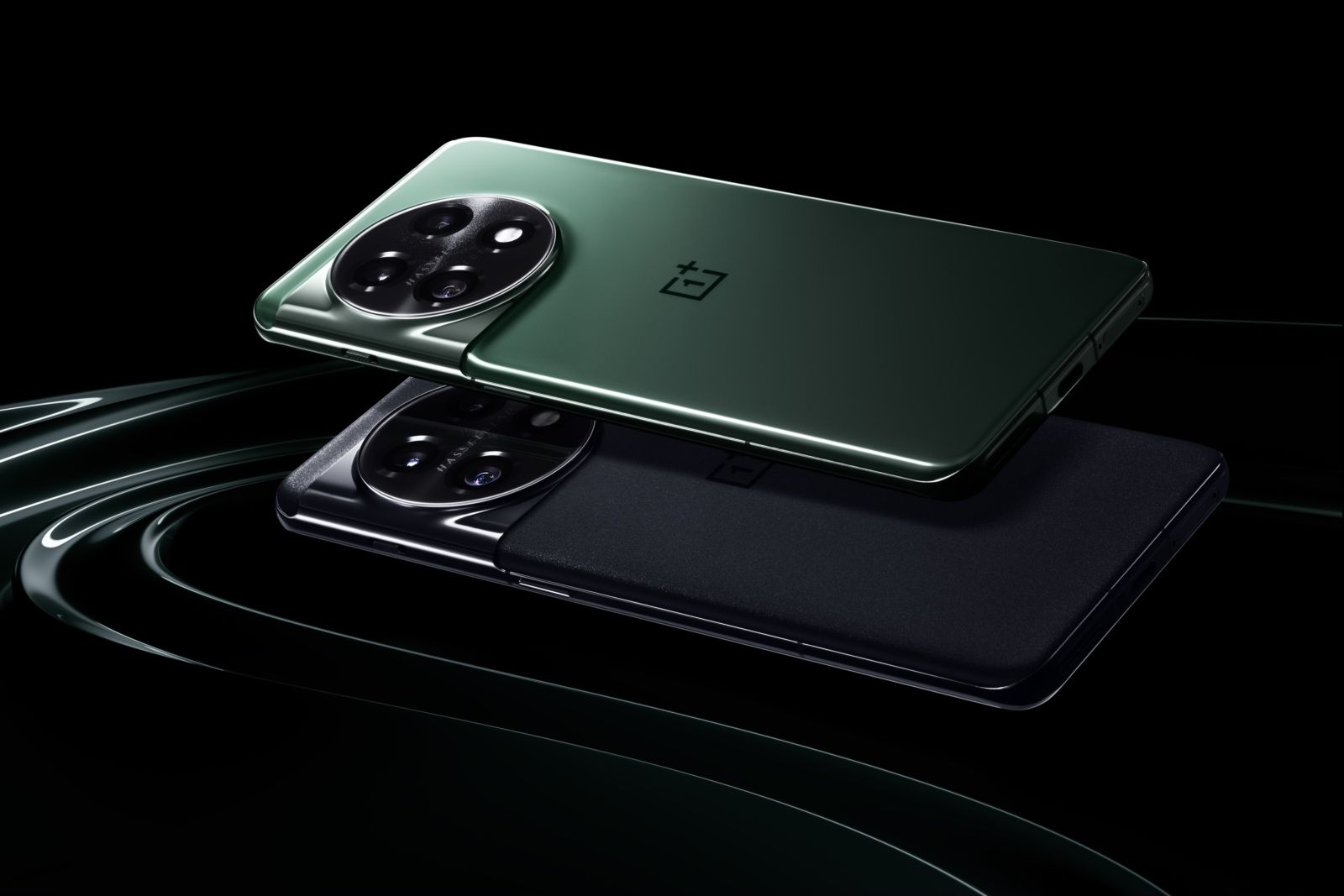 OnePlus 11 in green and black on a black background