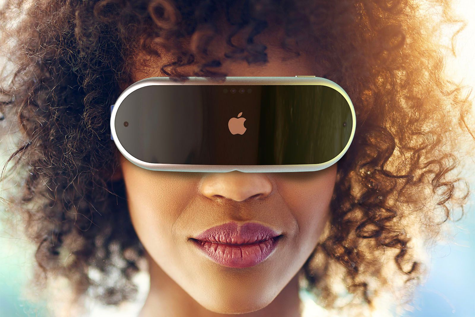 Apple's Reality Pro AR VR headset concept worn by person with curly hair