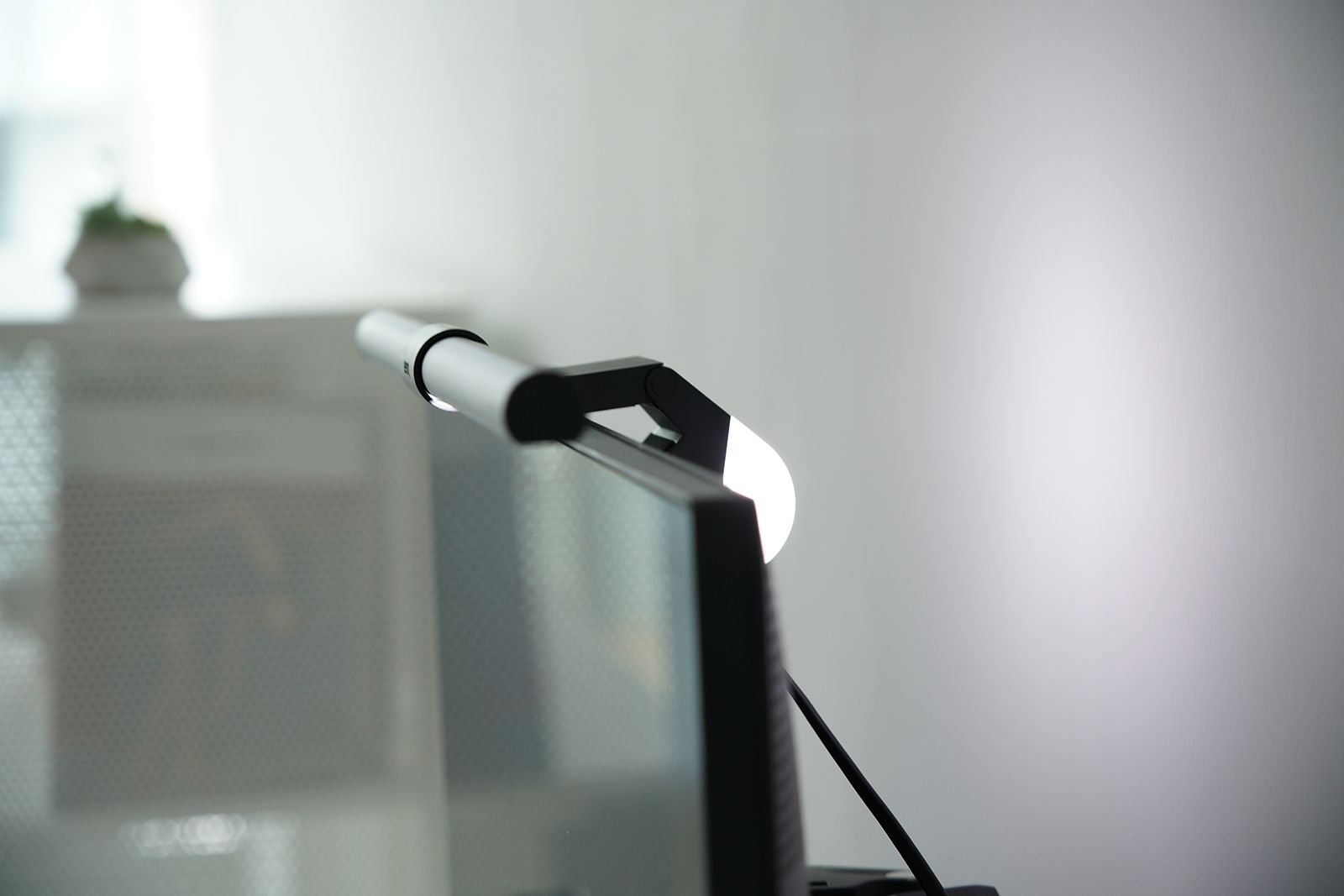 A side view of the BenQ ScreenBar Halo monitor light bar