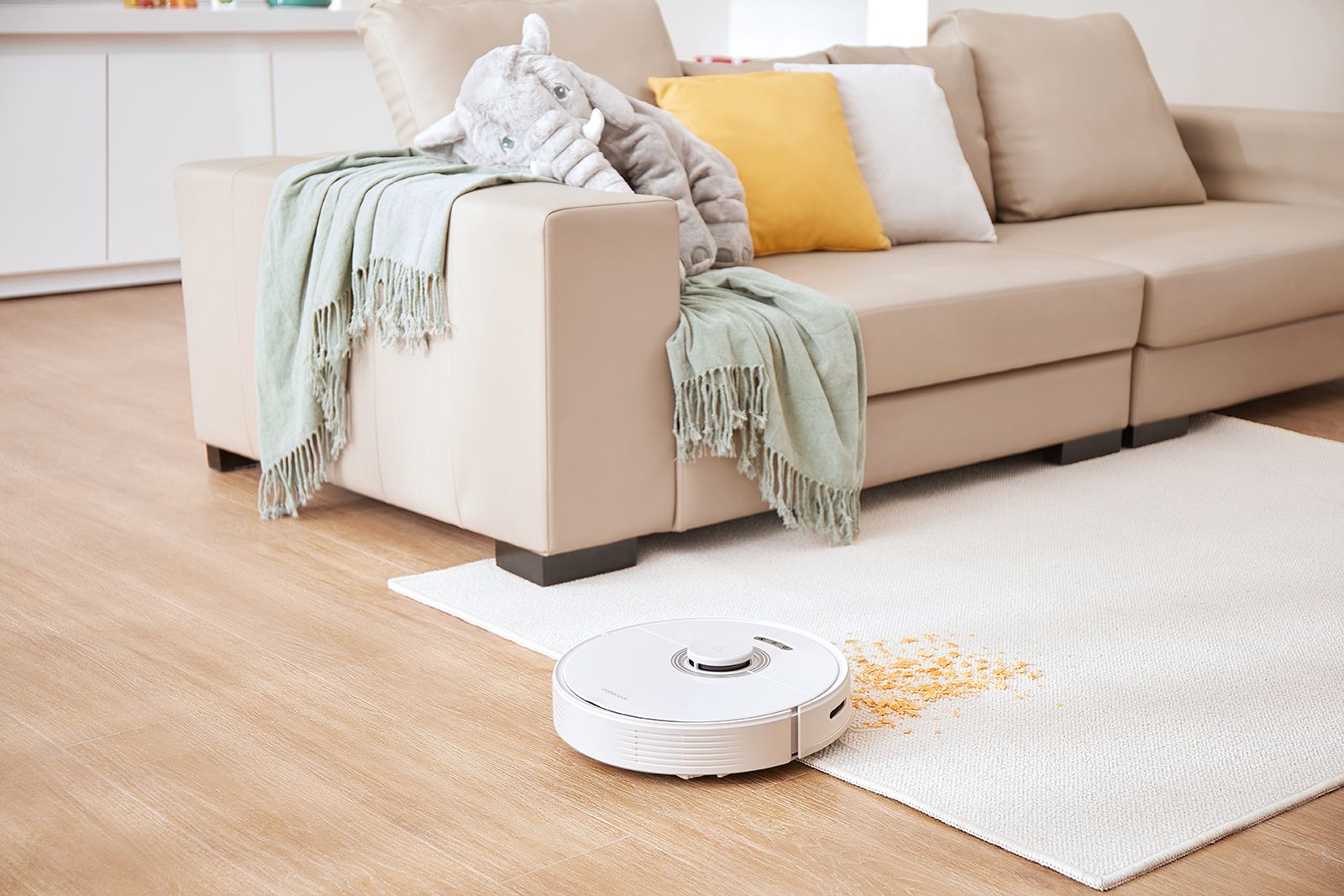 The Roborock Q7 Max vacuum cleans dirt from carpets