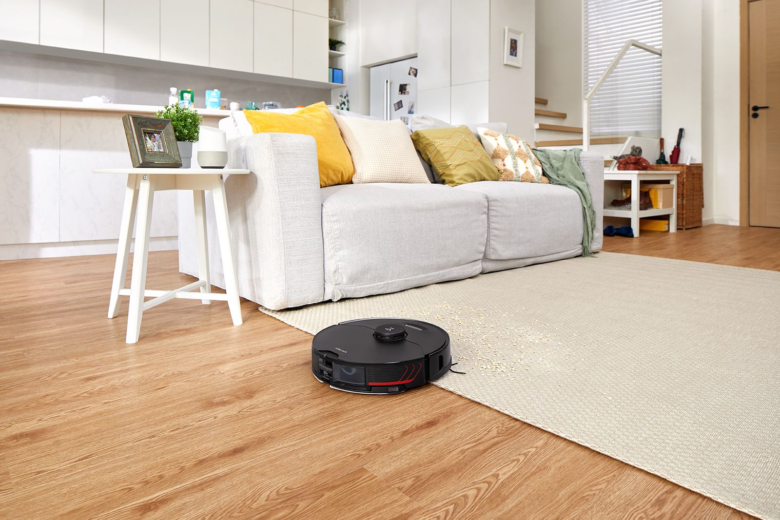 The Roborock S7 MaxV vacuum cleans carpets and wooden floors