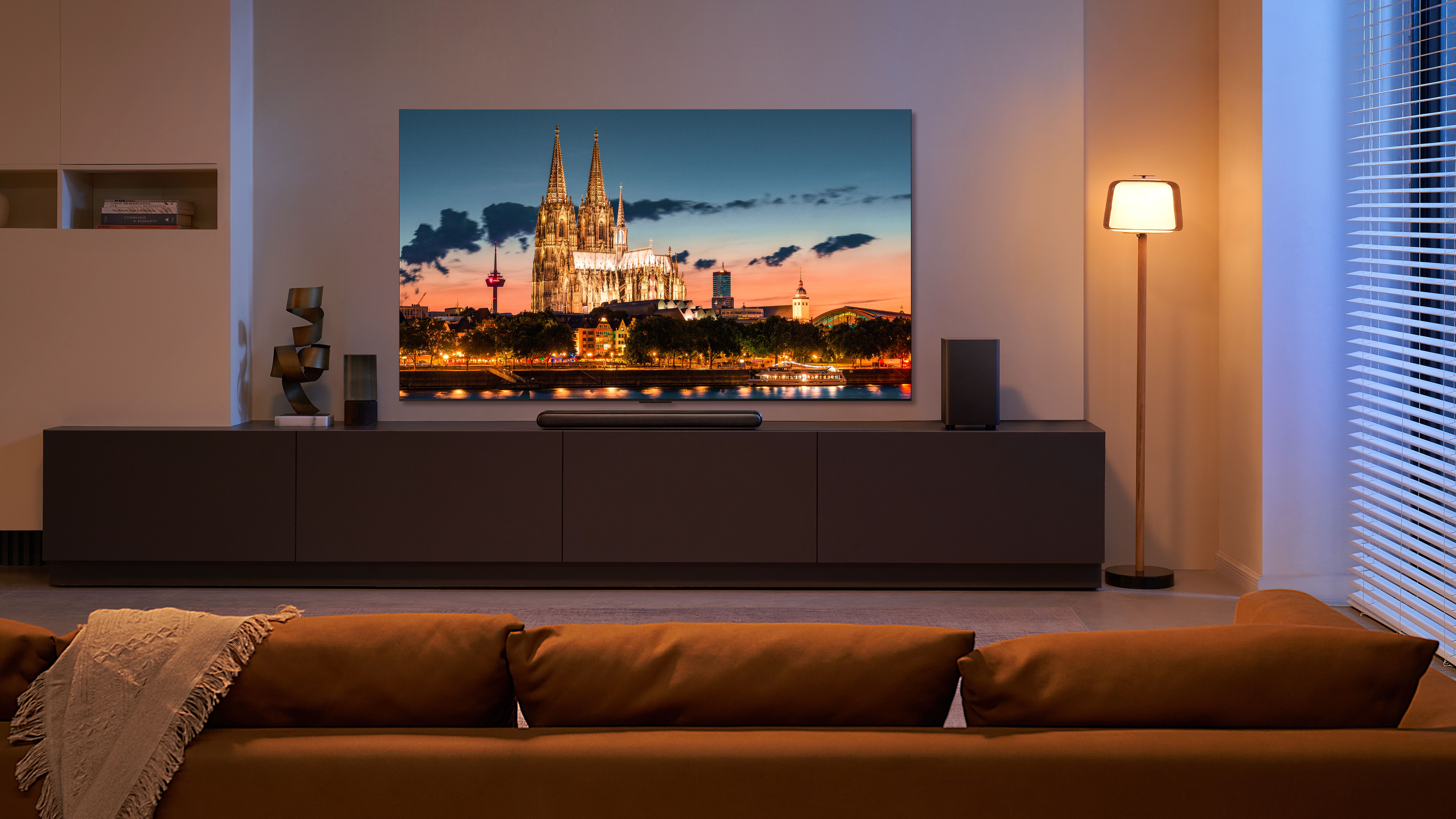 C955 TCL TV mounted on living room wall