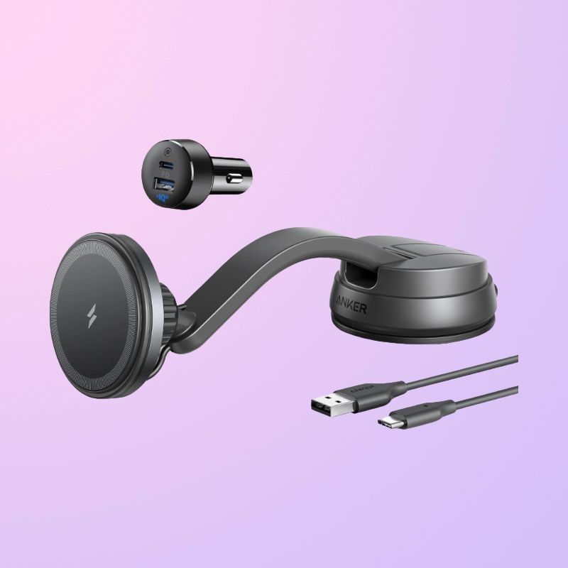 A curved magnetic car mount with a charger and cable on its sides.