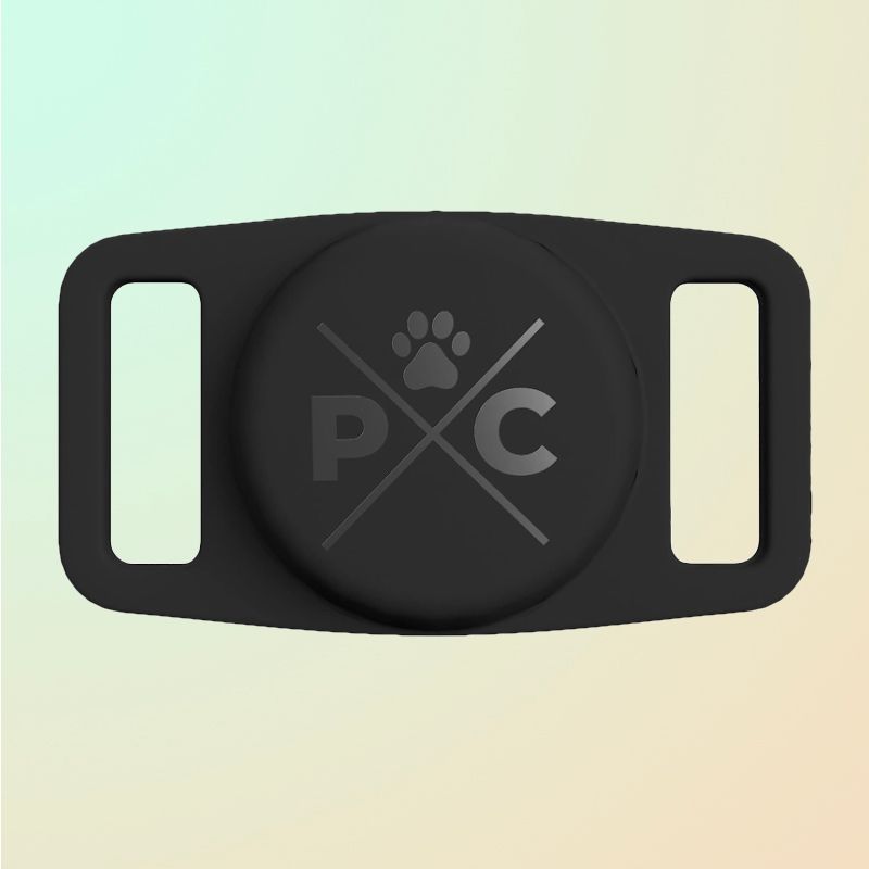 A silicone dog collar strap with a P and C on the front and loops on either side.