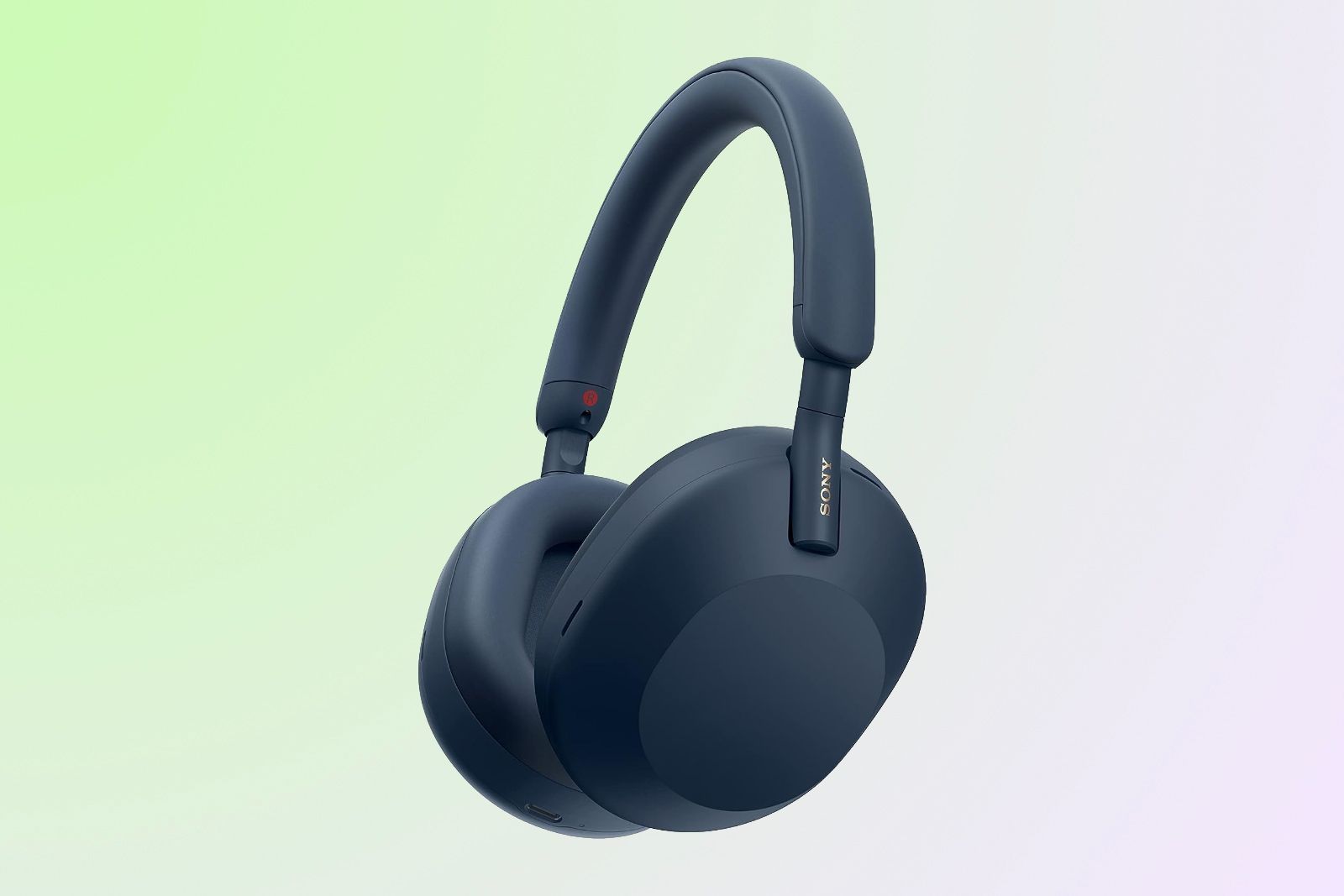 Blue Sony headphones over a blueish-green background