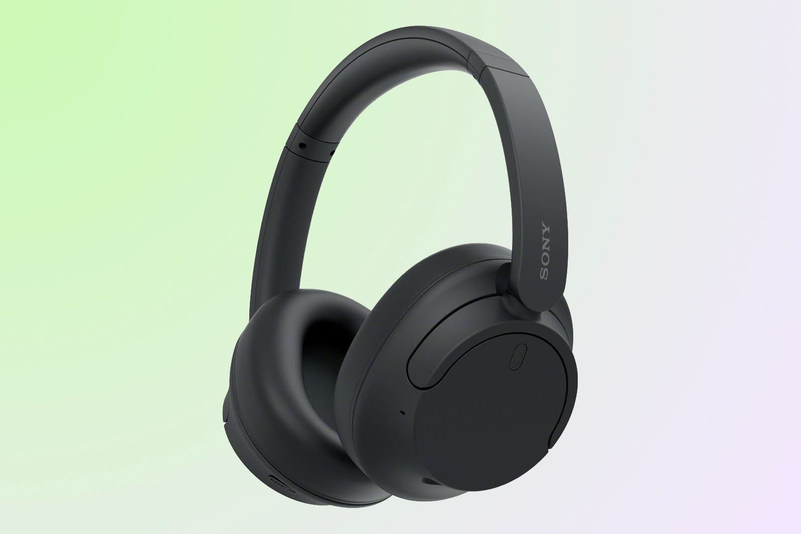 Black headphones with big ear cups on a greenish-blue background.