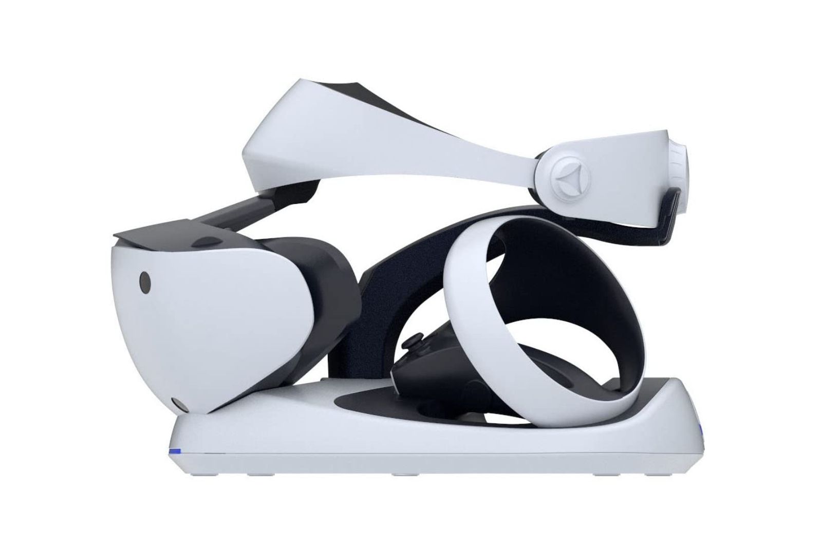 A black and white charging stand with a PS VR2 and its controllers sitting on it.