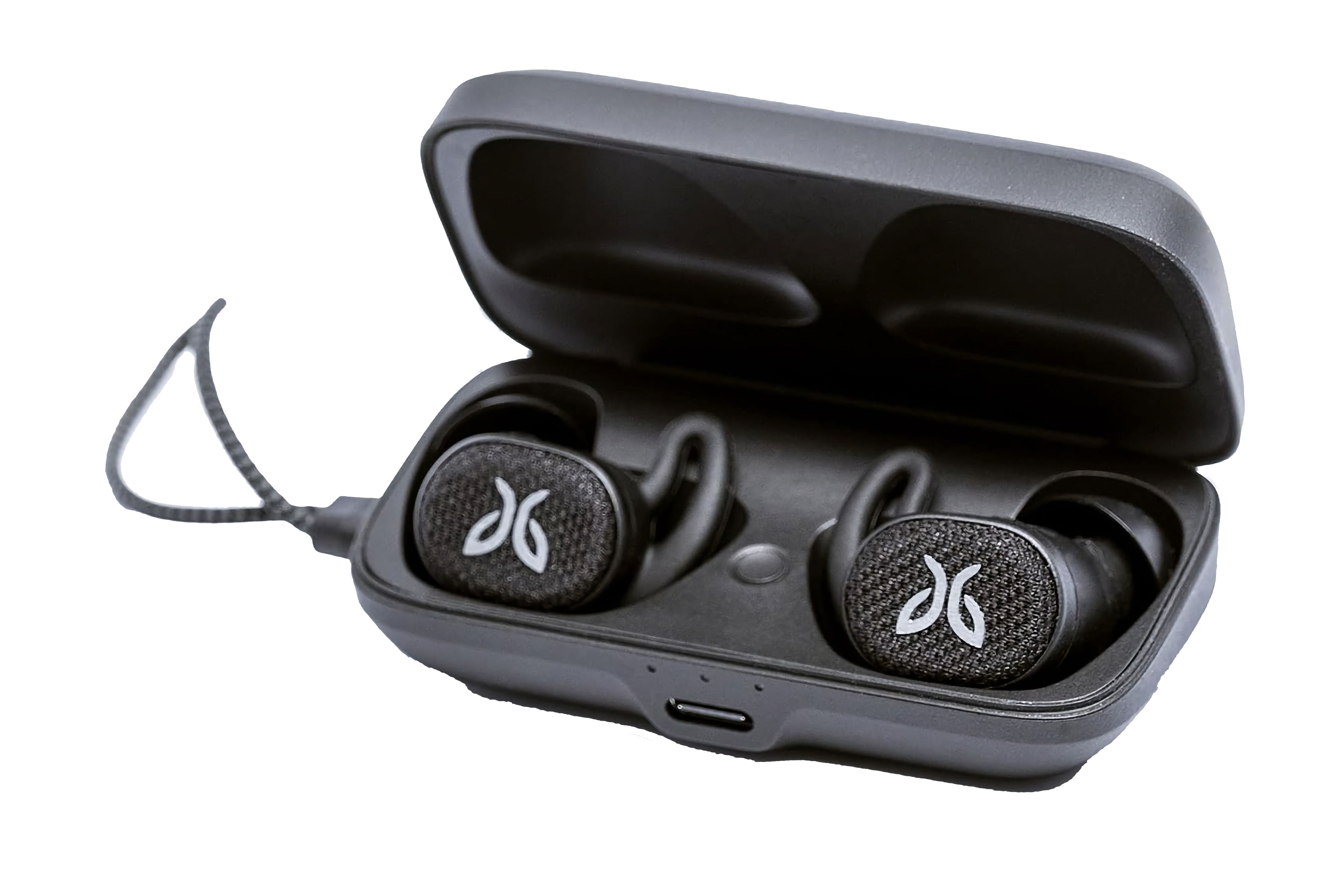 Black, textured headphones with wing tips, sitting in a charging case.
