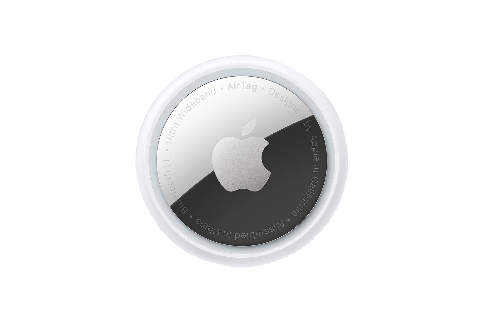 A circular silver and white tracker with an Apple logo on the back.