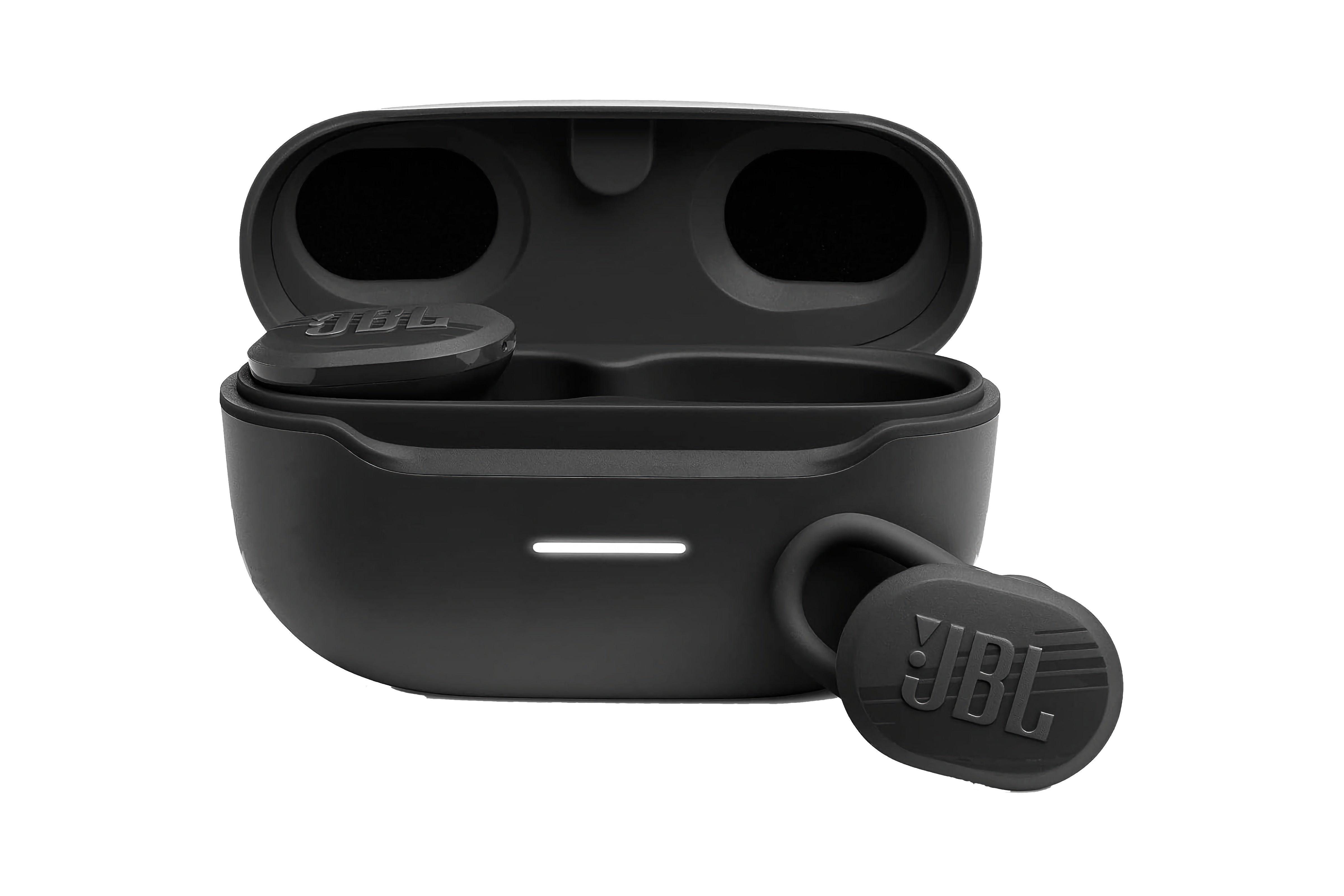 Black earbuds with a silicone loop sitting in front of a charging case.