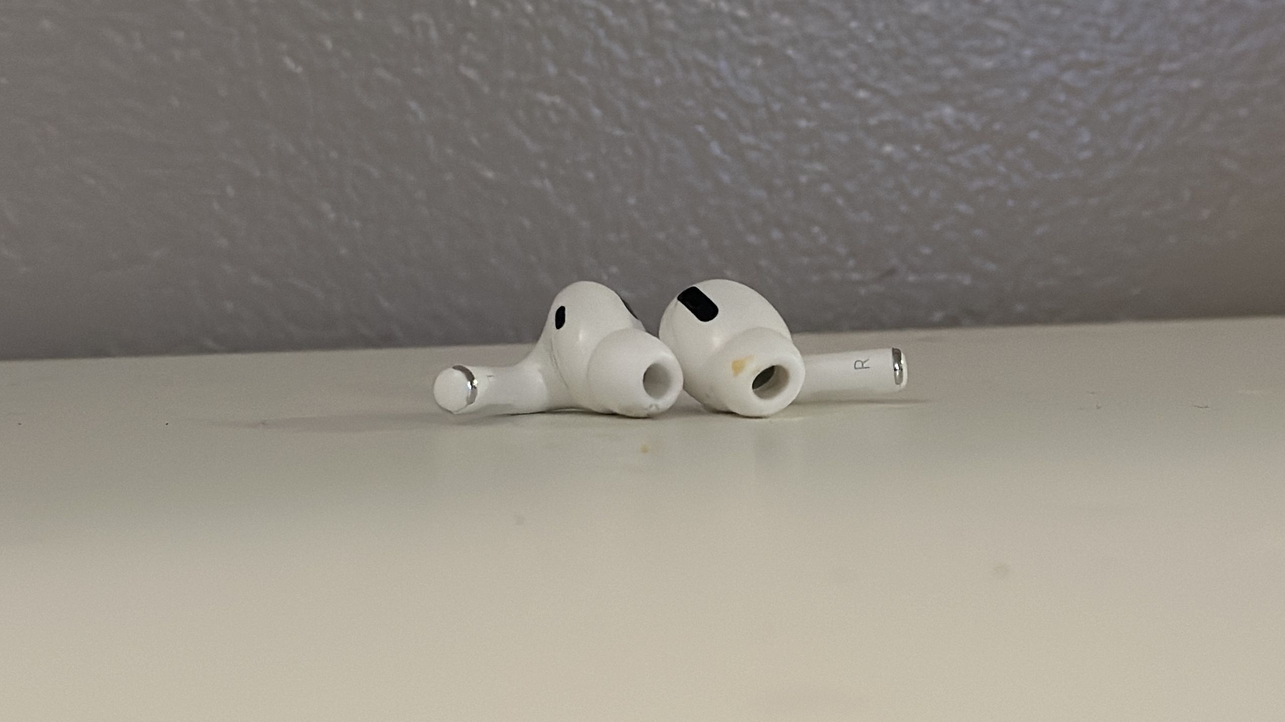 A dirty pair of AirPods Pro