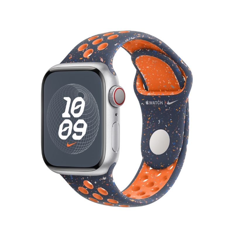 A silver Apple Watch with a blue and orange speckled band with cutouts.