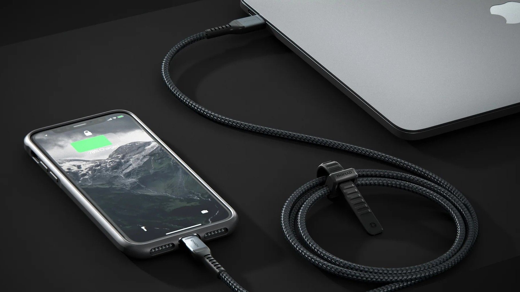 A Nomad Lightning connects an iPhone and MacBook Pro