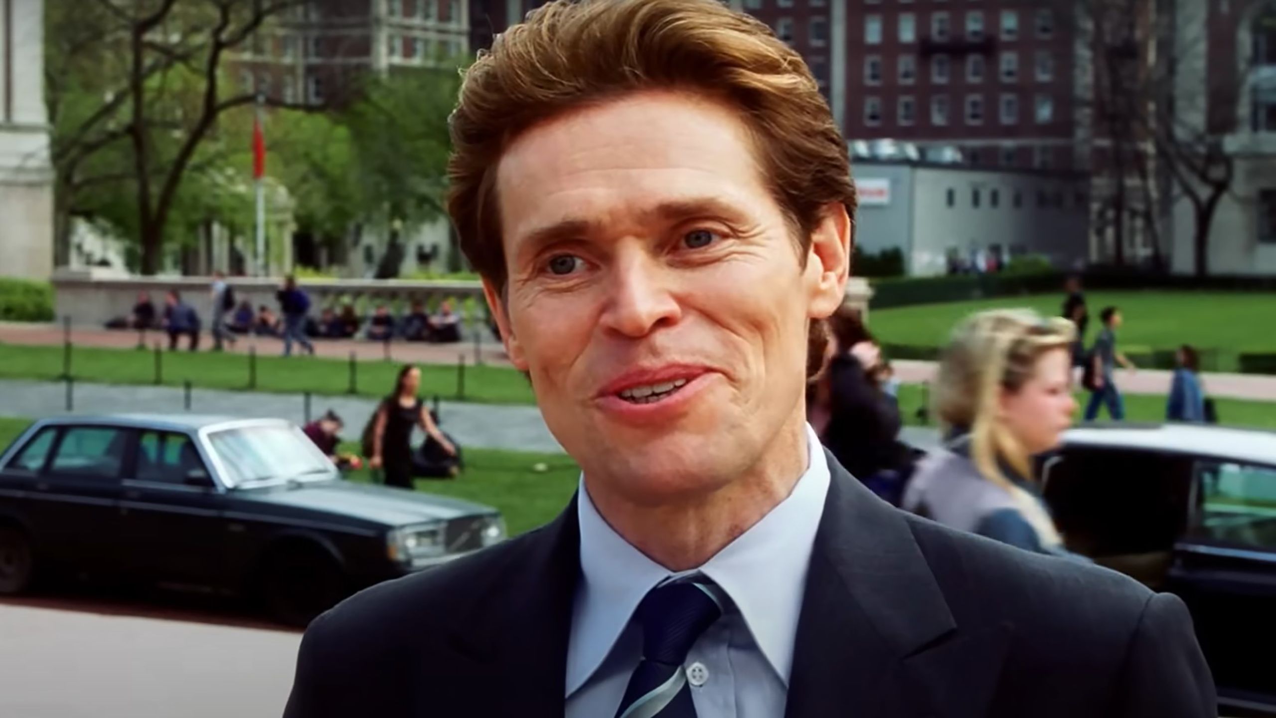 William Dafoe in a suit. 