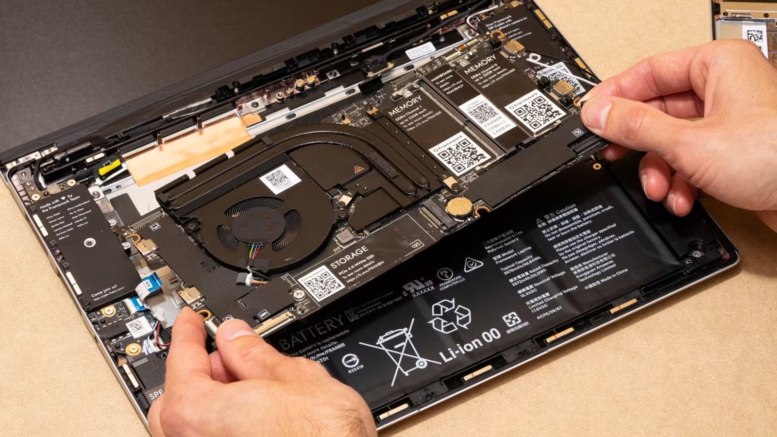 A laptop being assembled. 