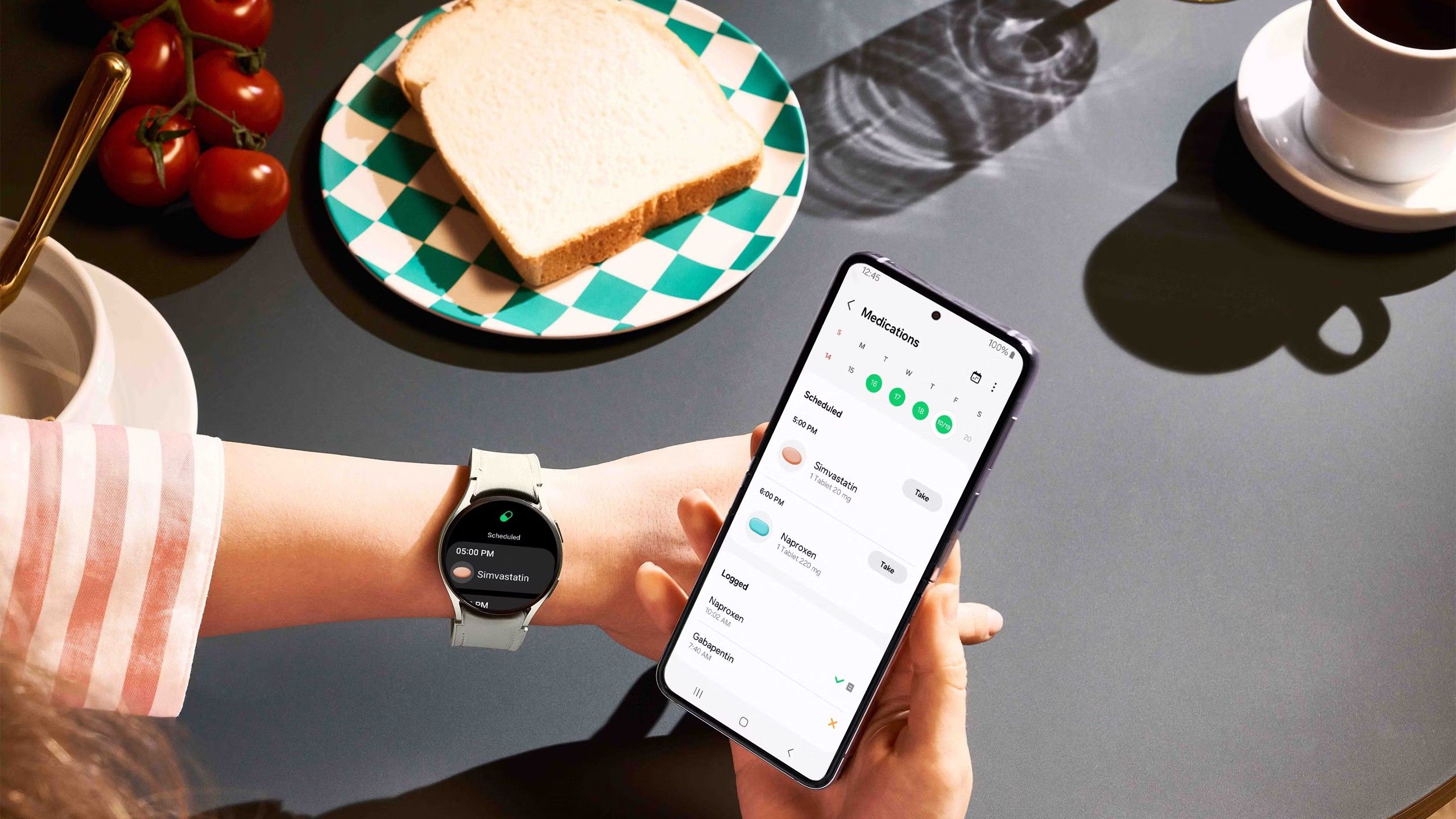 A woman uses Samsung Health's new Medication Tracking feature on her Galaxy S23 and Galaxy Watch 6.