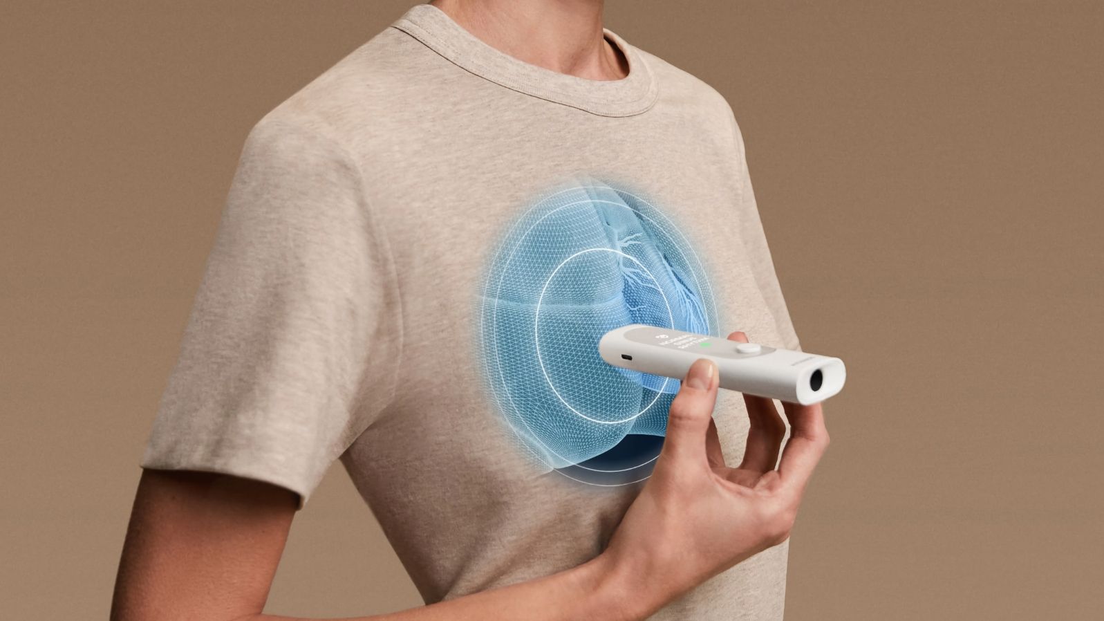 A person holding a Withings BeamO to their chest.