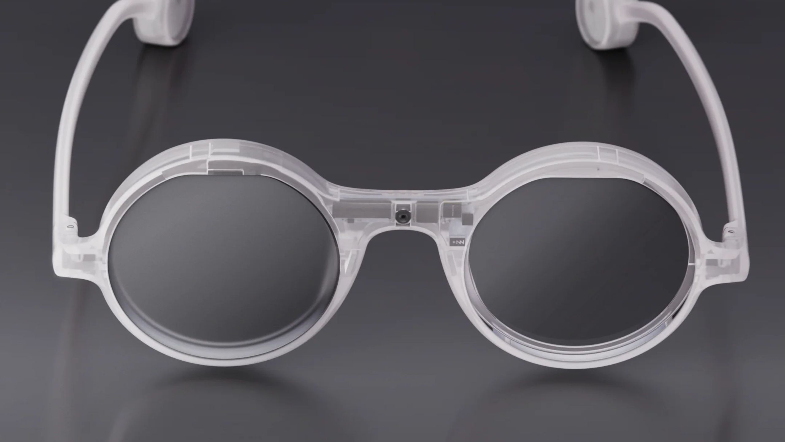 Clear circular AR glasses.