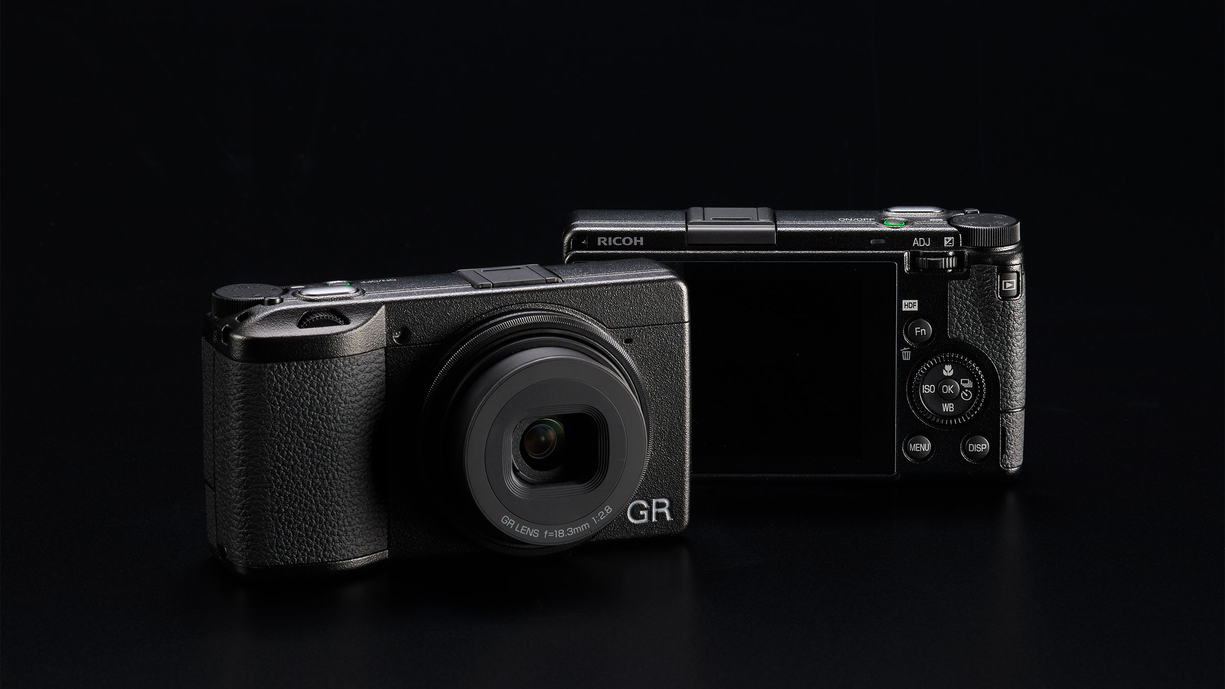 The Ricoh GR III HDF against a black background. 