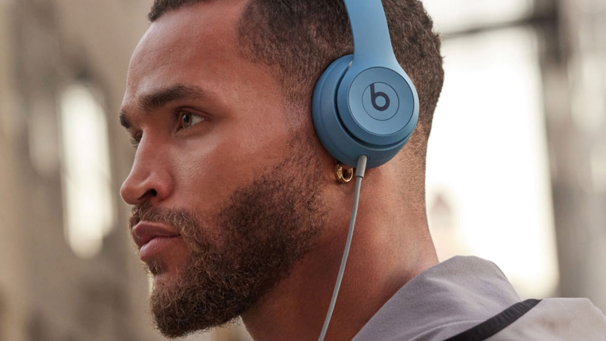 A man wearing Beats Solo 4.