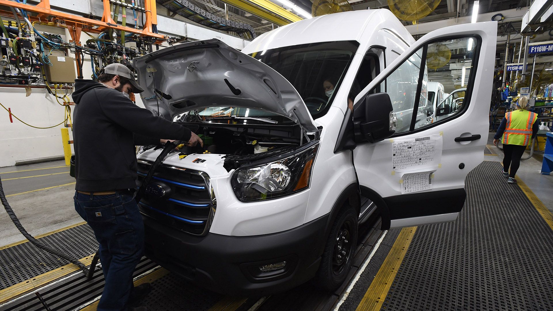 A worker assembling a Ford E-Transit van at the company's Kansas City Assembly Plant.