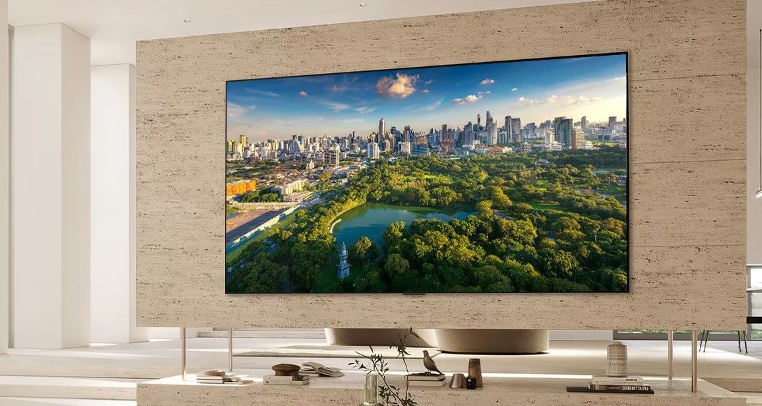 LG OLED TV in living room with screen showing a park