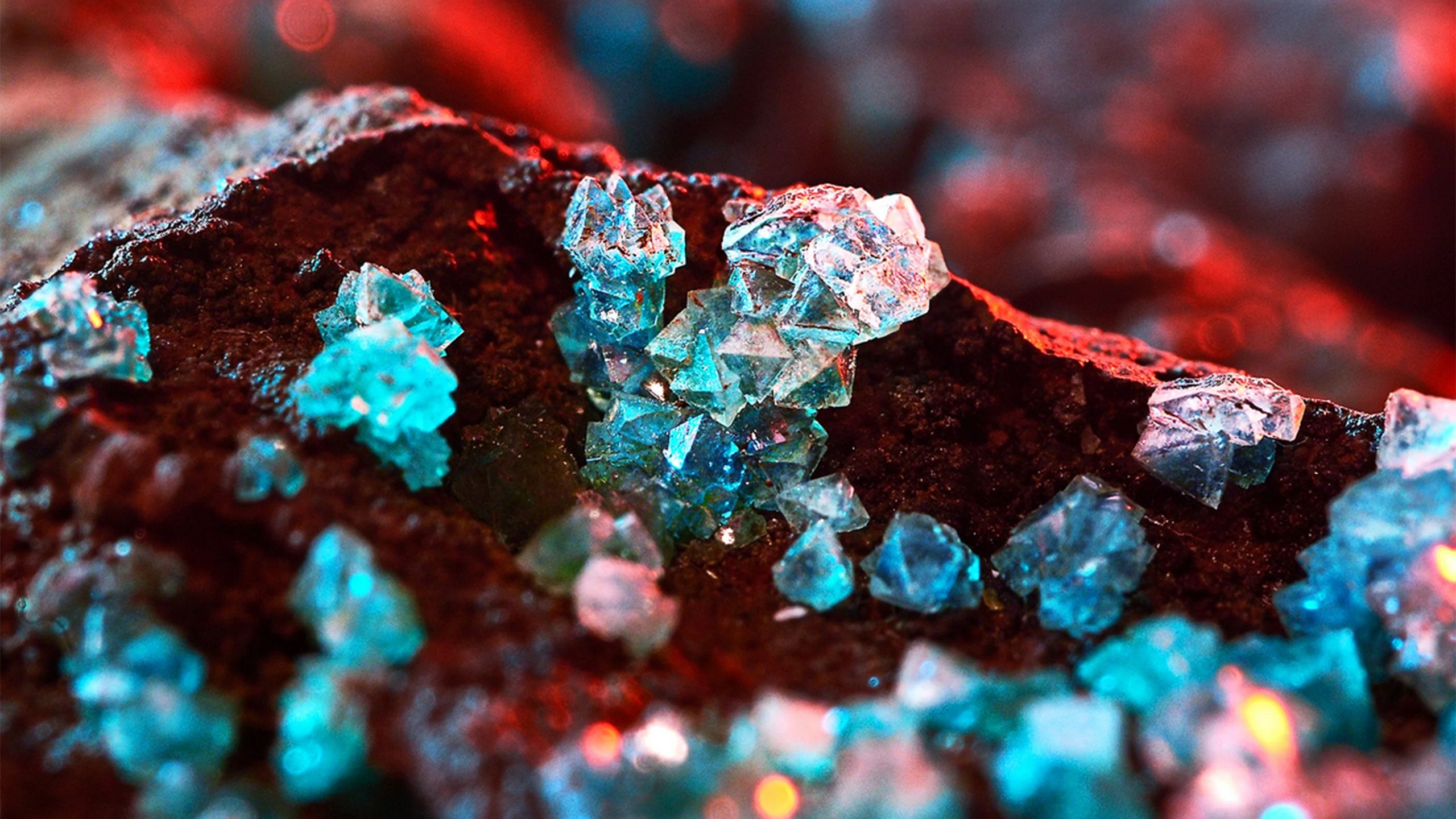 Blue crystals on red dirt demonstrating detailed images on Sony TVs
