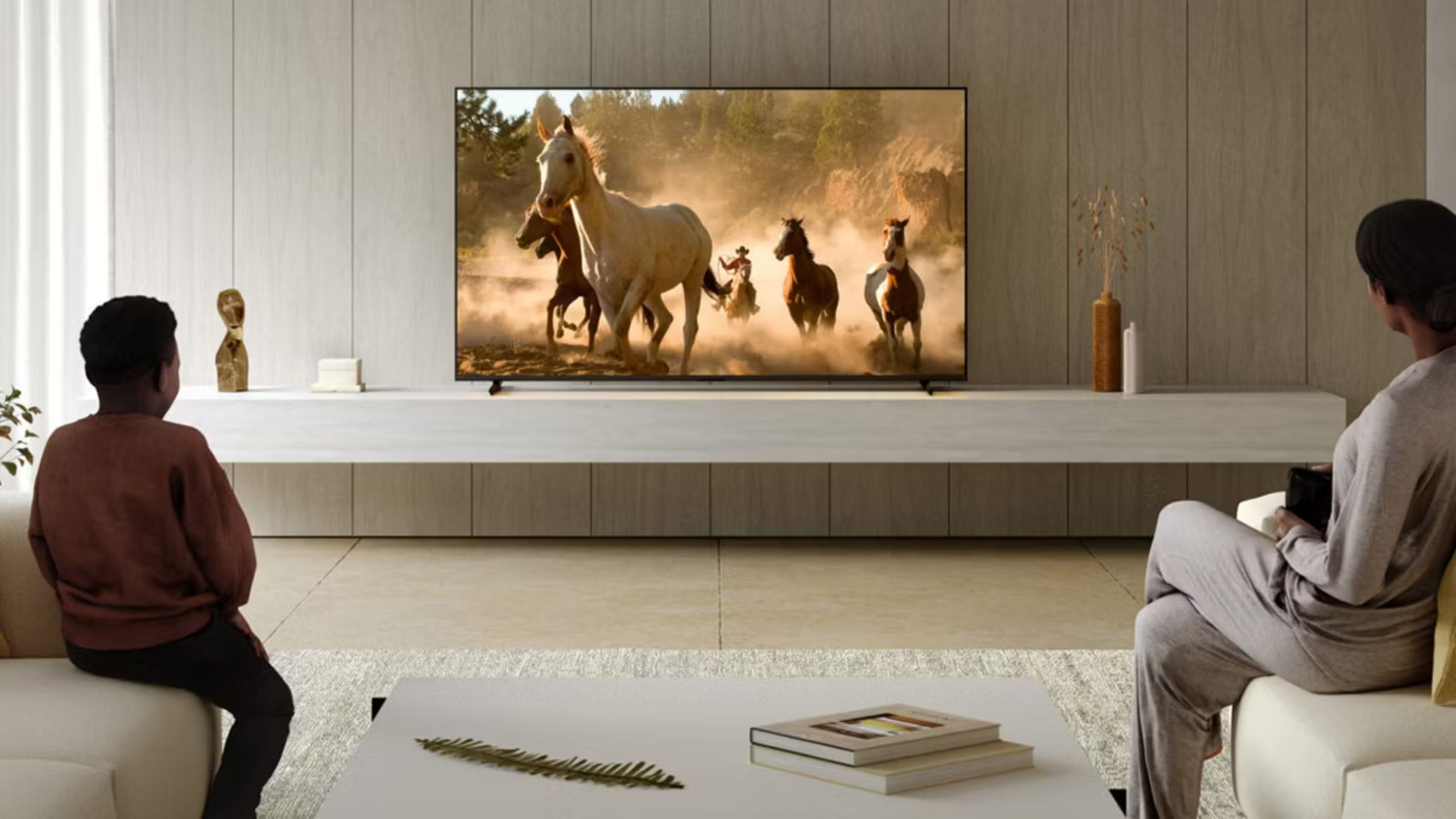 Sony Bravia XR TV range 2023 watched by woman and young boy