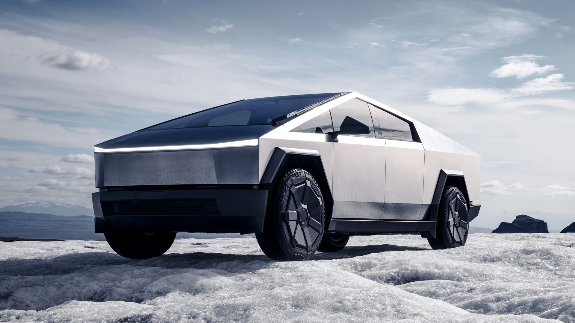 A Tesla Cybertruck on an ice field.