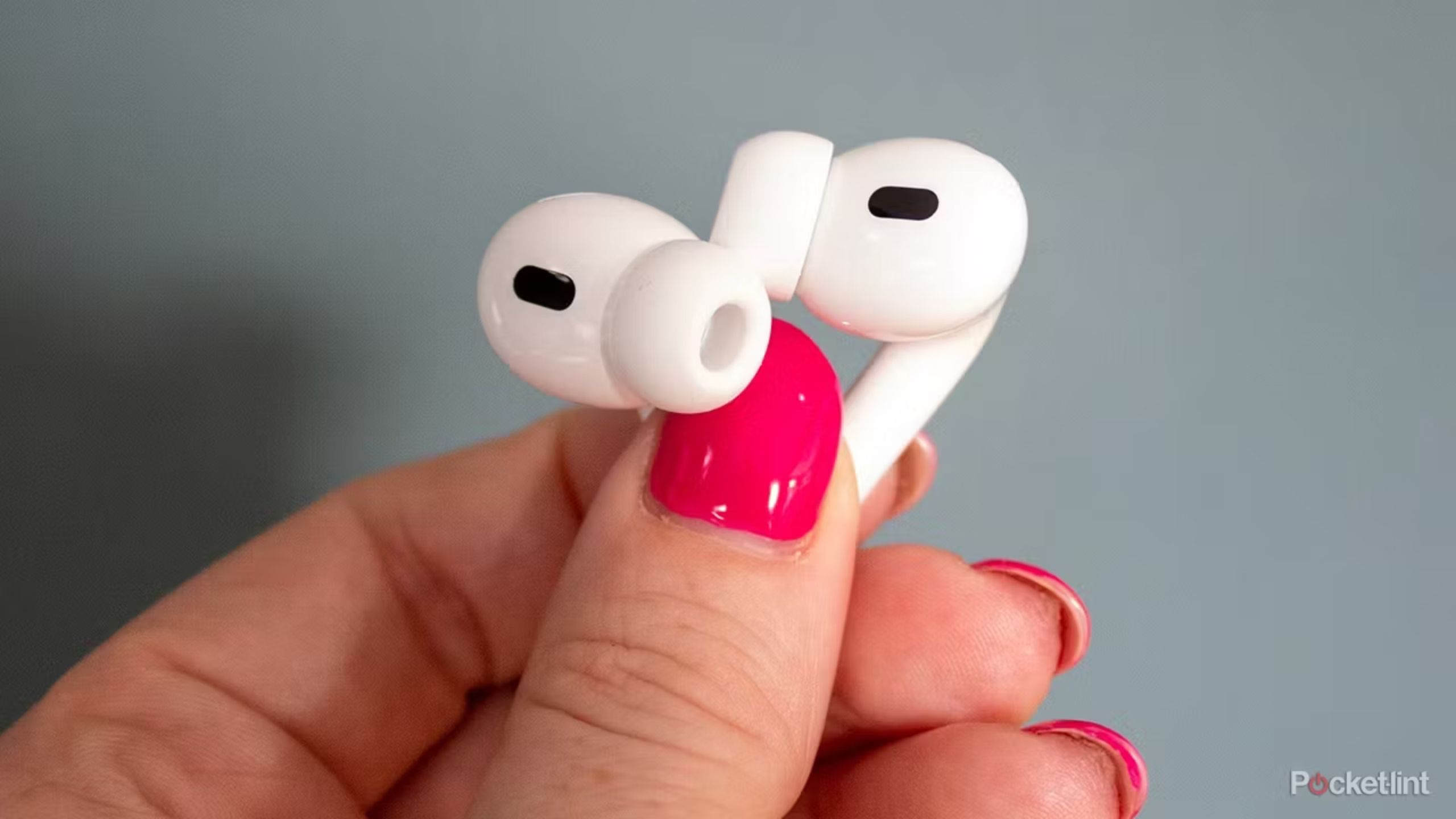 AirPods Pro in hand