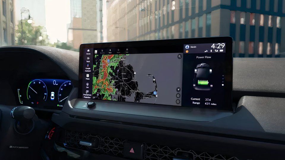 An Android Auto infotainment system displays the incoming weather. 