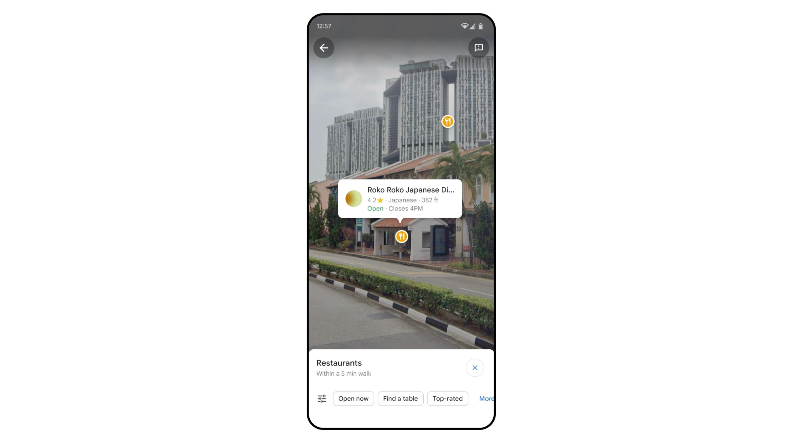 A smartphone displaying the Google Maps Google Lens view