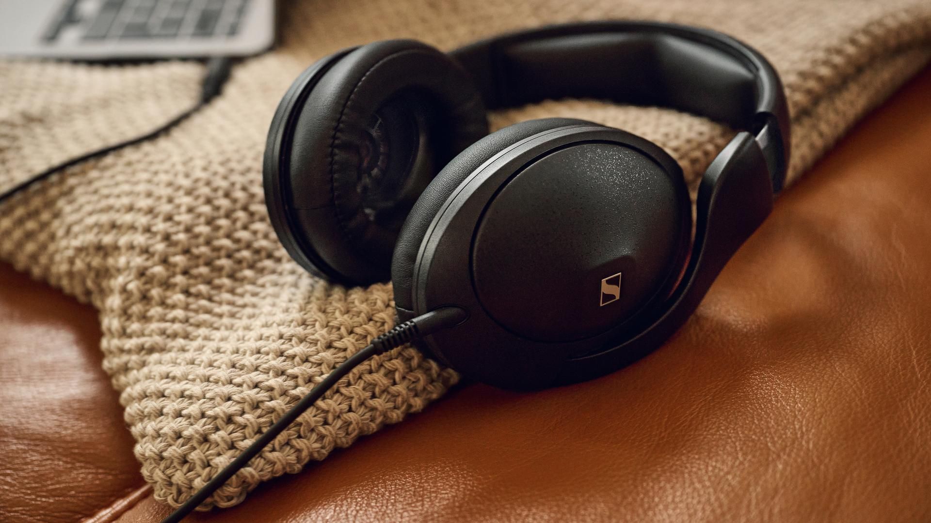 Sennheiser HD 620S on a brown leather couch