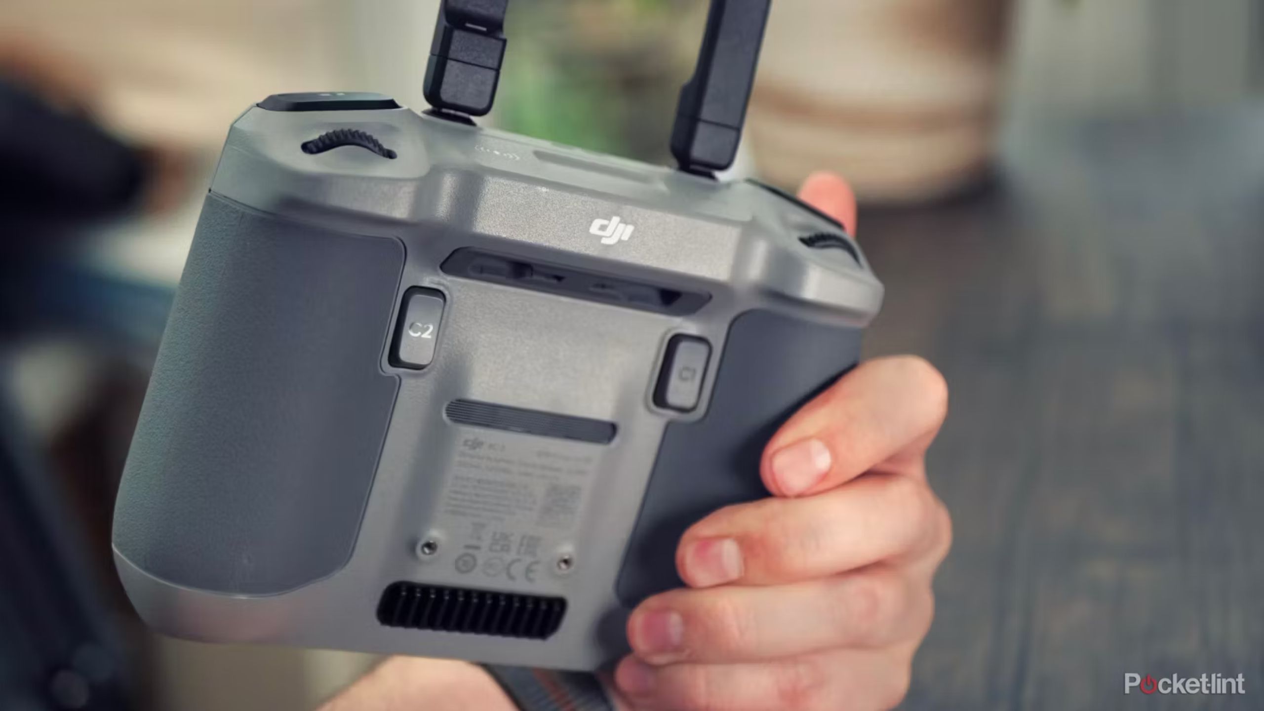 DJI Mini 4 Pro Controller in hand