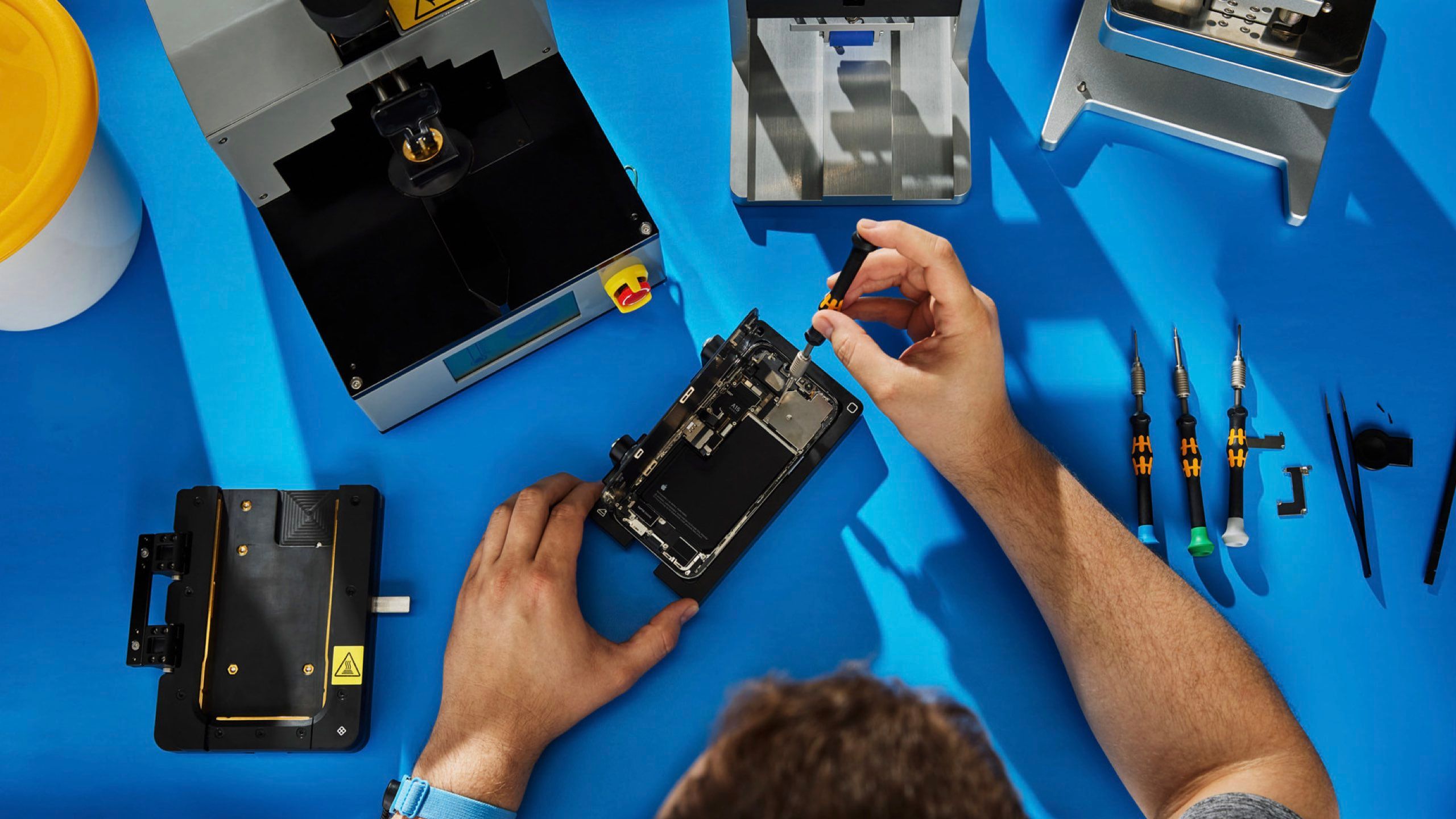 A person repairing an iPhone