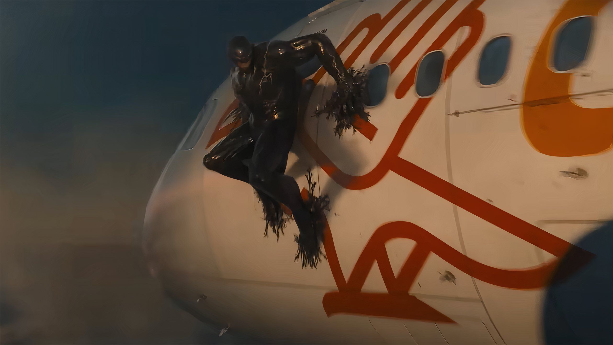 Venom on the side of an airplane