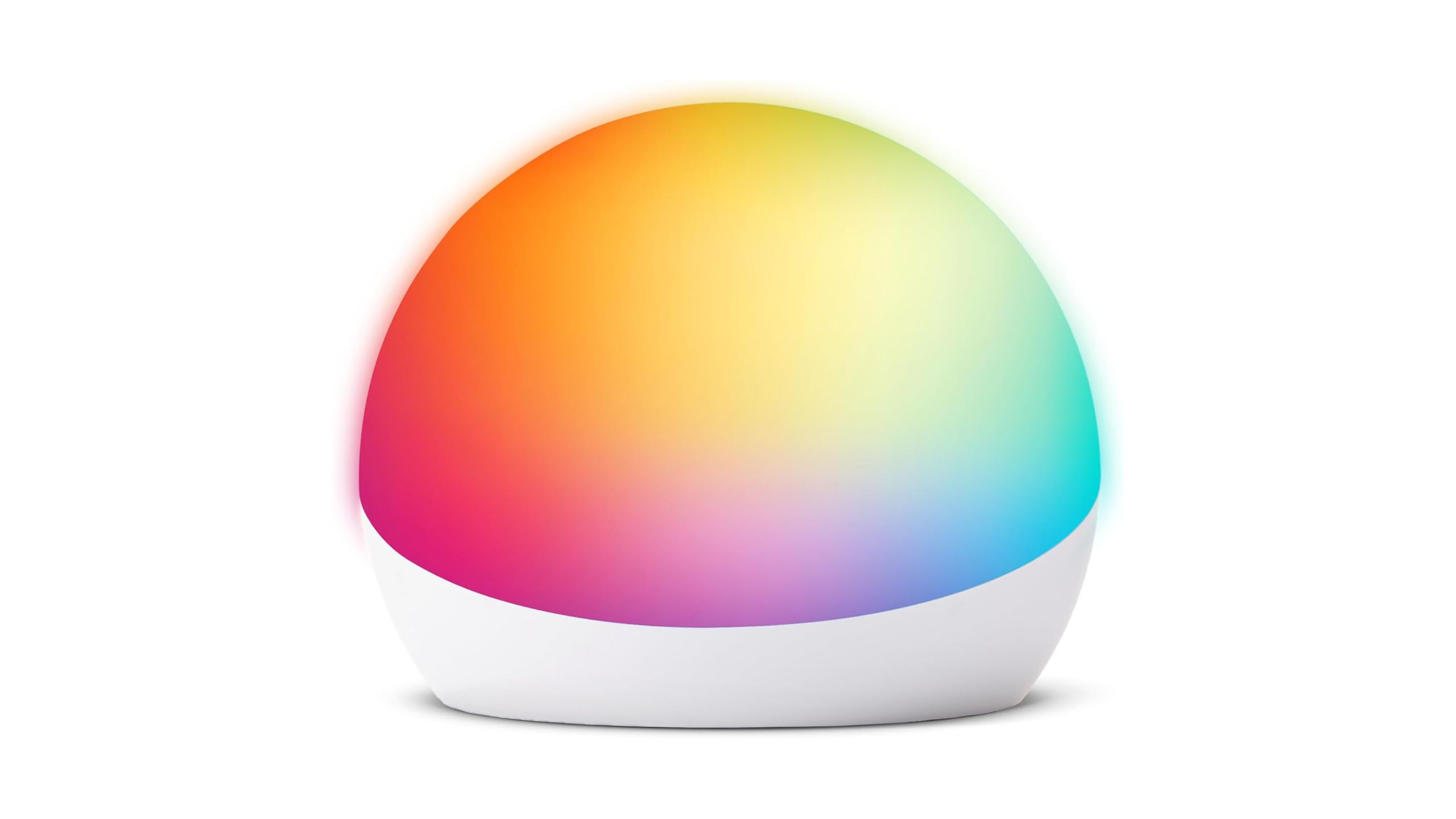 The Amazon Echo Glow with rainbow light against a white background. 